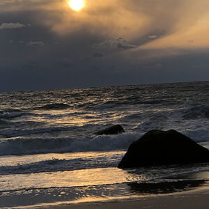dark sea and sun